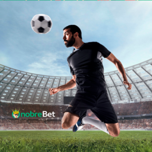 Campo de futebol ao fundo e na frente um jogador cabeceando uma bola - apostar no Botafogo